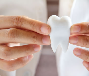 For Worth Dental Implants, Holding a Teeth